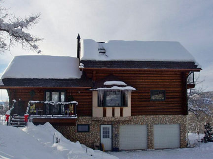 A low-voltage roof de-icing system installed under the shingles to heat roof eaves. Heated roof eaves.